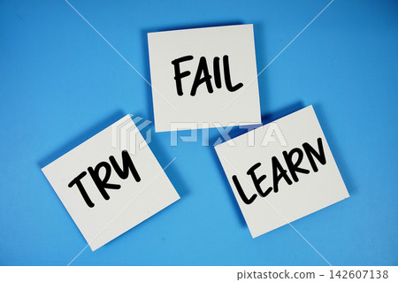 Try, Fail, Learn message on paper note flat lay on blue background Try, Fail, Learn message on paper note flat lay on blue background 142607138