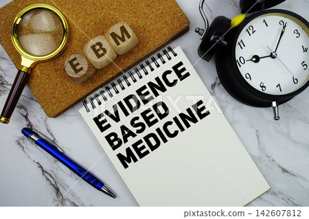 EBM Evidence Based Medicine text written on notepad with calculator and magnifying glass on marble background EBM Evidence Based Medicine text written on notepad with calculator and magnifying glass on marble background 142607812