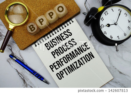 BPPO Business Process Performance Optimization text written on notepad with calculator and magnifying glass on marble background BPPO Business Process Performance Optimization text written on notepad with calculator and magnifying glass on marble background 142607813