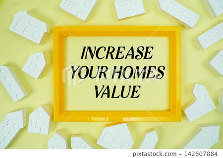 Increase Your Homes Value text with house models on yellow background Increase Your Homes Value text with house models on yellow background 142607884