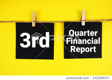 3rd Quarter Financial Report paper notes hanging on the rope with clothespins 3rd Quarter Financial Report paper notes hanging on the rope with clothespins 142608037