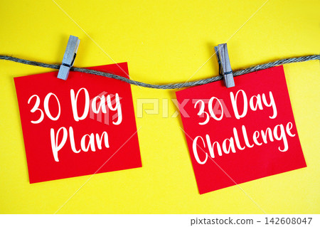 30 Day Plan with 30 Day Challenge paper notes hanging on the rope with clothespins 30 Day Plan with 30 Day Challenge paper notes hanging on the rope with clothespins 142608047
