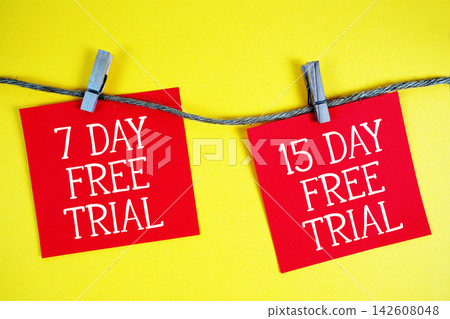 7 Day and 15 Day Free Trial paper notes hanging on the rope with clothespins 7 Day and 15 Day Free Trial paper notes hanging on the rope with clothespins 142608048