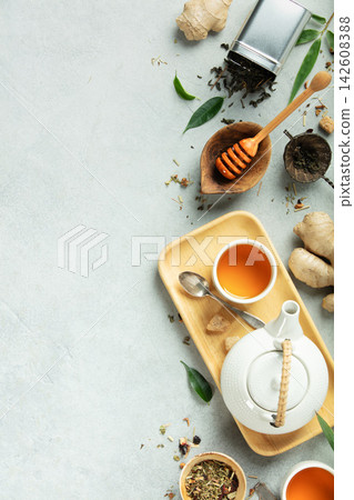 Natural Tea and Wellness Flat Lay with Herbs, Honey, and Ginger Natural Tea and Wellness Flat Lay with Herbs, Honey, and Ginger 142608388