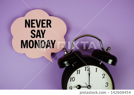 Never Say Monday text on speech bubble with alarm clock on purple background Never Say Monday text on speech bubble with alarm clock on purple background 142608454