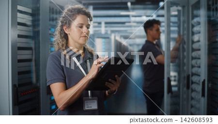 IT Team Conducting Server Room Audit with Digital Tablet 142608593