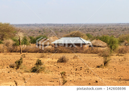 Traditional Maasai village in Tanzania, East Africa Traditional Maasai village in Tanzania, East Africa 142608696