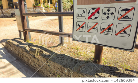 Public rules sign uses pictograms to show prohibited activities in an outdoor recreation area. Concepts: public safety, regulations, visitor guidance, responsible tourism, behavior, recreation Public rules sign uses pictograms to show prohibited activities in an outdoor recreation area. Concepts: public safety, regulations, visitor guidance, responsible tourism, behavior, recreation 142609394