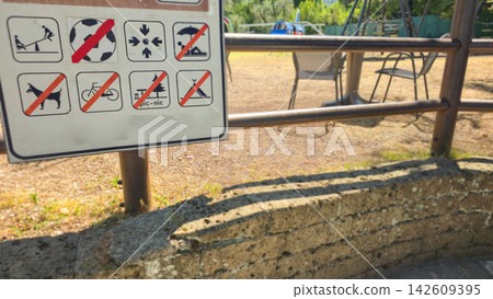 Public rules sign uses pictograms to show prohibited activities in an outdoor recreation area. Concepts: public safety, regulations, visitor guidance, responsible tourism, behavior, recreation Public rules sign uses pictograms to show prohibited activities in an outdoor recreation area. Concepts: public safety, regulations, visitor guidance, responsible tourism, behavior, recreation 142609395