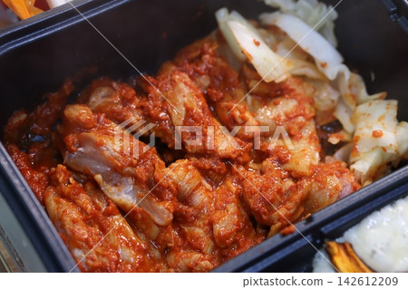 Marinated Chicken with Onions in Tray Marinated Chicken with Onions in Tray 142612209