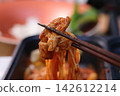 Spicy Korean Noodles with Chopsticks Close-Up 142612214