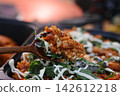 Spoonful of Savory Risotto with Greens and Creamy Sauce 142612218
