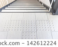 Tactile paving for the visually impaired located in front of stairs in public facilities 142612224