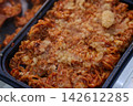 Crispy Korean Fried Rice Dish in Container 142612285
