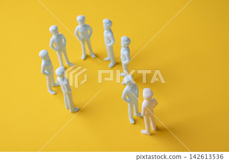 Social exclusion and outsider concept with one person blocked from joining a group Social exclusion and outsider concept with one person blocked from joining a group 142613536
