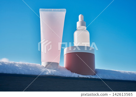 Skincare product bottles presenting winter beauty routine Skincare product bottles presenting winter beauty routine 142613565