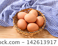 Free-range eggs in a basket 142613917