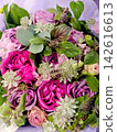 Pink flower arrangement 142616613
