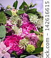 Pink flower arrangement is 142616615