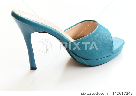 green high heels shoes on white background green high heels shoes on white background 142617242