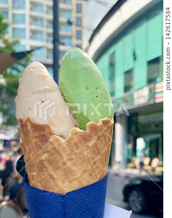 A double waffle cone of gelato, a popular treat in Thailand. A double waffle cone of gelato, a popular treat in Thailand. 142617584