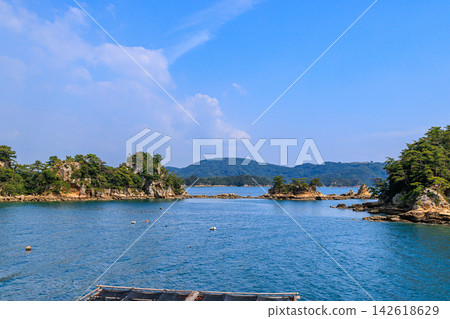 Touring the islands of Kujukushima by sightseeing boat. Touring the islands of Kujukushima by sightseeing boat. 142618629
