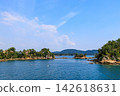 Touring the islands of Kujukushima by sightseeing boat. Touring the islands of Kujukushima by sightseeing boat. 142618631