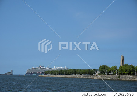 Cruise ship moored behind the breakwater at the mouth of the Bilbao estuary Cruise ship moored behind the breakwater at the mouth of the Bilbao estuary 142623586