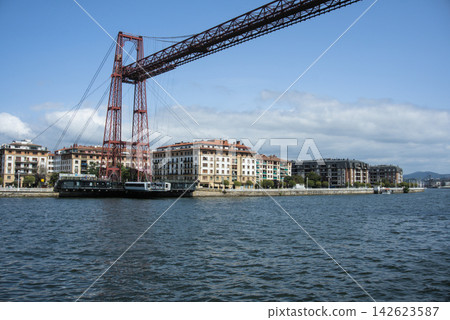 Vizcaya transporter bridge and the waterfront of Las Arenas on the Bilbao estuary Vizcaya transporter bridge and the waterfront of Las Arenas on the Bilbao estuary 142623587