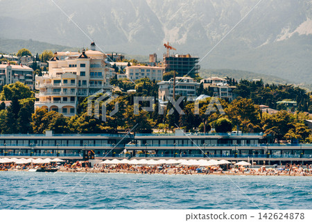Yalta, Crimea, View cityscape panorama of city from Black Sea Yalta, Crimea, View cityscape panorama of city from Black Sea 142624878