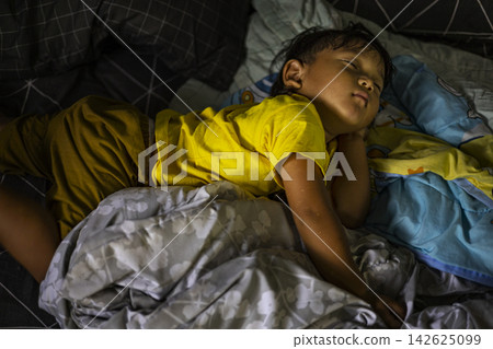 Toddler Sleeping Peacefully During Afternoon Nap 142625099