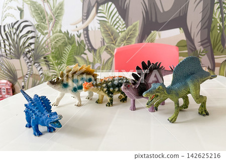 Playroom for preschool children, plastic kid toy dinosaurs collection childhood 142625216