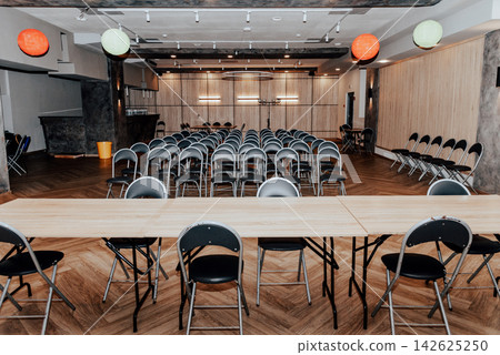 Interior of large classroom, student class at institute, conference hall lecture Interior of large classroom, student class at institute, conference hall lecture 142625250