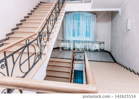 Staircase stair between floors, entrance to residential multi-storey building Staircase stair between floors, entrance to residential multi-storey building 142625514