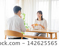 A couple who eats breakfast A couple who eats breakfast 142625565