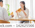 A couple who eats breakfast A couple who eats breakfast 142625566
