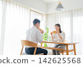 A couple who eats breakfast A couple who eats breakfast 142625568