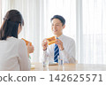 A couple who eats breakfast A couple who eats breakfast 142625571