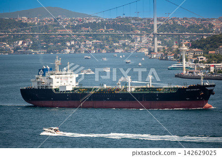 Istanbul,turkey,august 3, 2025. Large tanker ship kriti episkopi transits the bosphorus with istanbul skyline and bridge on a sunny day, busy international waterway Istanbul,turkey,august 3, 2025. Large tanker ship kriti episkopi transits the bosphorus with istanbul skyline and bridge on a sunny day, busy international waterway 142629025
