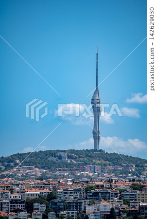 Istanbul,turkey,august 3, 2025. Camlica tower, a modern telecommunications landmark, rising prominently over the urban landscape of istanbul, turkey, on a clear day Istanbul,turkey,august 3, 2025. Camlica tower, a modern telecommunications landmark, rising prominently over the urban landscape of istanbul, turkey, on a clear day 142629030
