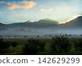 Sunrise and morning clouds shrouded in morning mist from Odashirogahara in Oku-Nikko in early autumn. 142629299
