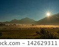 Sunrise and morning clouds shrouded in morning mist from Odashirogahara in Oku-Nikko in early autumn. 142629311