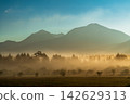 Sunrise and morning clouds shrouded in morning mist from Odashirogahara in Oku-Nikko in early autumn. 142629313