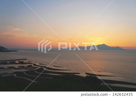 View from the Mikoshiku Coast Observation Deck: Sand patterns and Mount Unzen-Fugen. View from the Mikoshiku Coast Observation Deck: Sand patterns and Mount Unzen-Fugen. 142632435