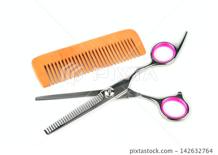 Hair Thinning Scissors and Wooden Comb Isolated on White Background Hair Thinning Scissors and Wooden Comb Isolated on White Background 142632764