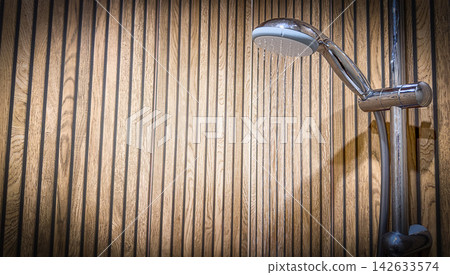 Running shower water from chrome showerhead, plumbing installation, hygiene, bathroom repair, banner with copy space ad. Running shower water from chrome showerhead, plumbing installation, hygiene, bathroom repair, banner with copy space ad. 142633574