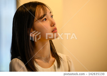pensive young woman pensive young woman 142635130