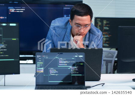 Programmer Developing Software with Artificial Intelligence Code Programmer Developing Software with Artificial Intelligence Code 142635540