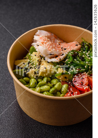 An Asian style bowl with shrimp, edamame, tomatoes, and wakame. A shrimp and vegetable bowl An Asian style bowl with shrimp, edamame, tomatoes, and wakame. A shrimp and vegetable bowl 142635626