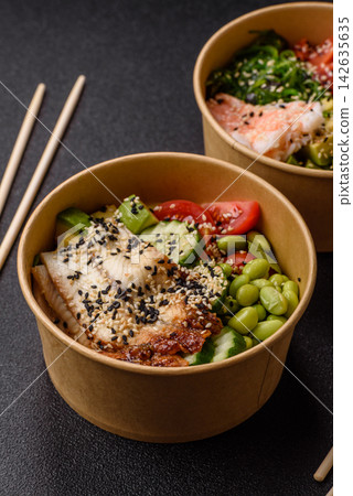 An Asian style bowl with shrimp, edamame, tomatoes, and wakame. A shrimp and vegetable bowl An Asian style bowl with shrimp, edamame, tomatoes, and wakame. A shrimp and vegetable bowl 142635635